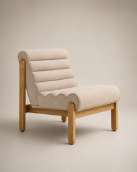 A modern accent chair with a light beige ribbed fabric upholstery and a natural wood frame, shown against a solid warm beige background.