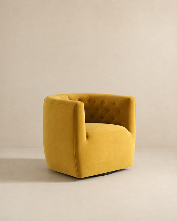 A modern mustard yellow velvet armchair with a tufted button backrest, shown against a neutral beige studio background.
