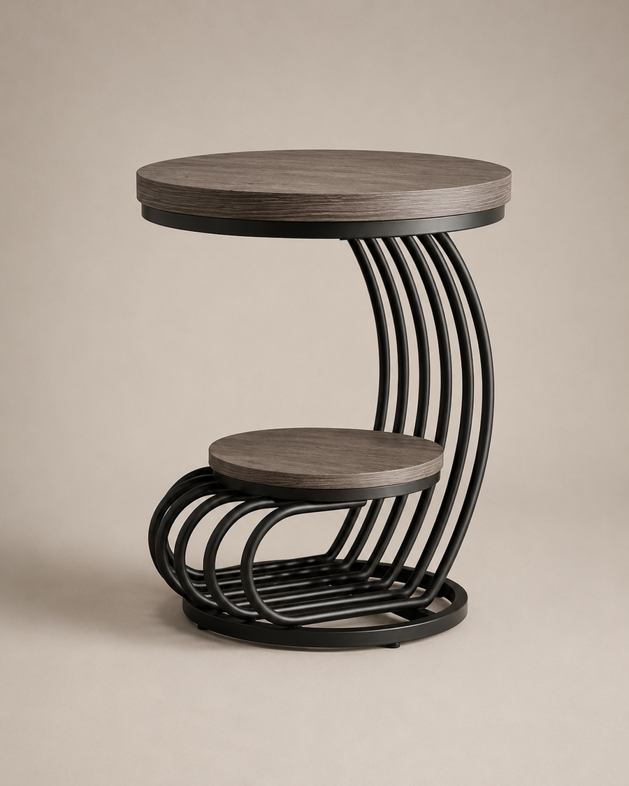 A modern two-tier side table featuring round gray wood-look tabletops and a sculptural black metal frame with curved, parallel vertical bars.
