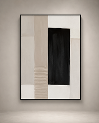 A framed abstract geometric wall art print hanging on a warm beige wall. The artwork features a minimalist composition with a large black vertical rectangle, cream, off-white, and beige blocks, and a ribbed beige section, all enclosed in a thin black frame.