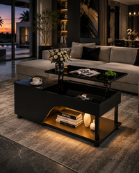 A modern black coffee table with a lift-top design and warm under-shelf lighting, styled in a contemporary living room with a gray sectional sofa and a rug.