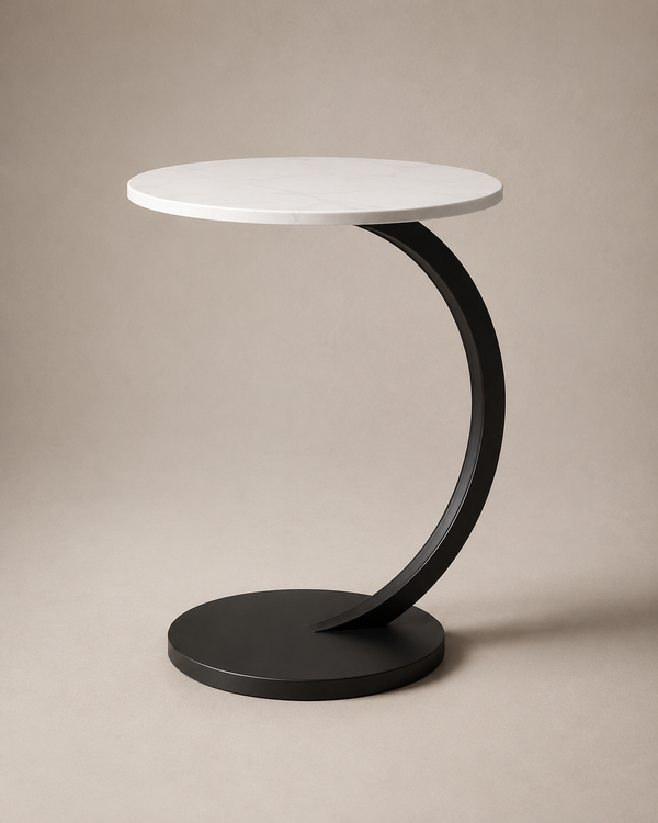 A modern side table with a round white top and a curved black metal base, photographed on a neutral beige studio background.